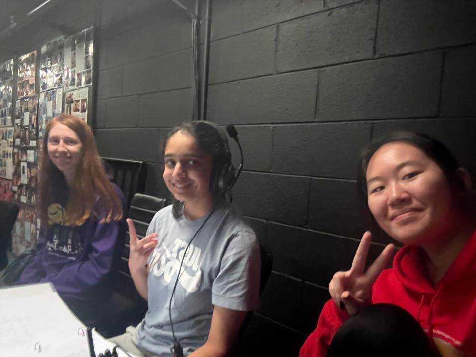 Theatre crew members backstage